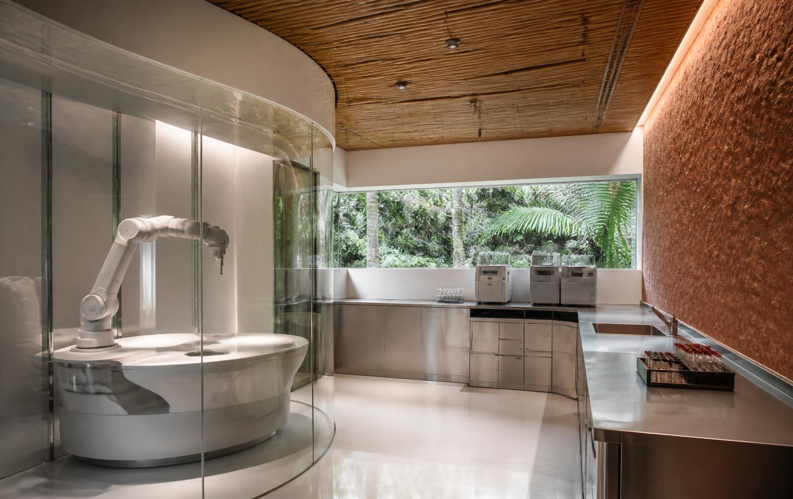 Concept interior: laboratory with a robotic phlebotomy station behind curved glass